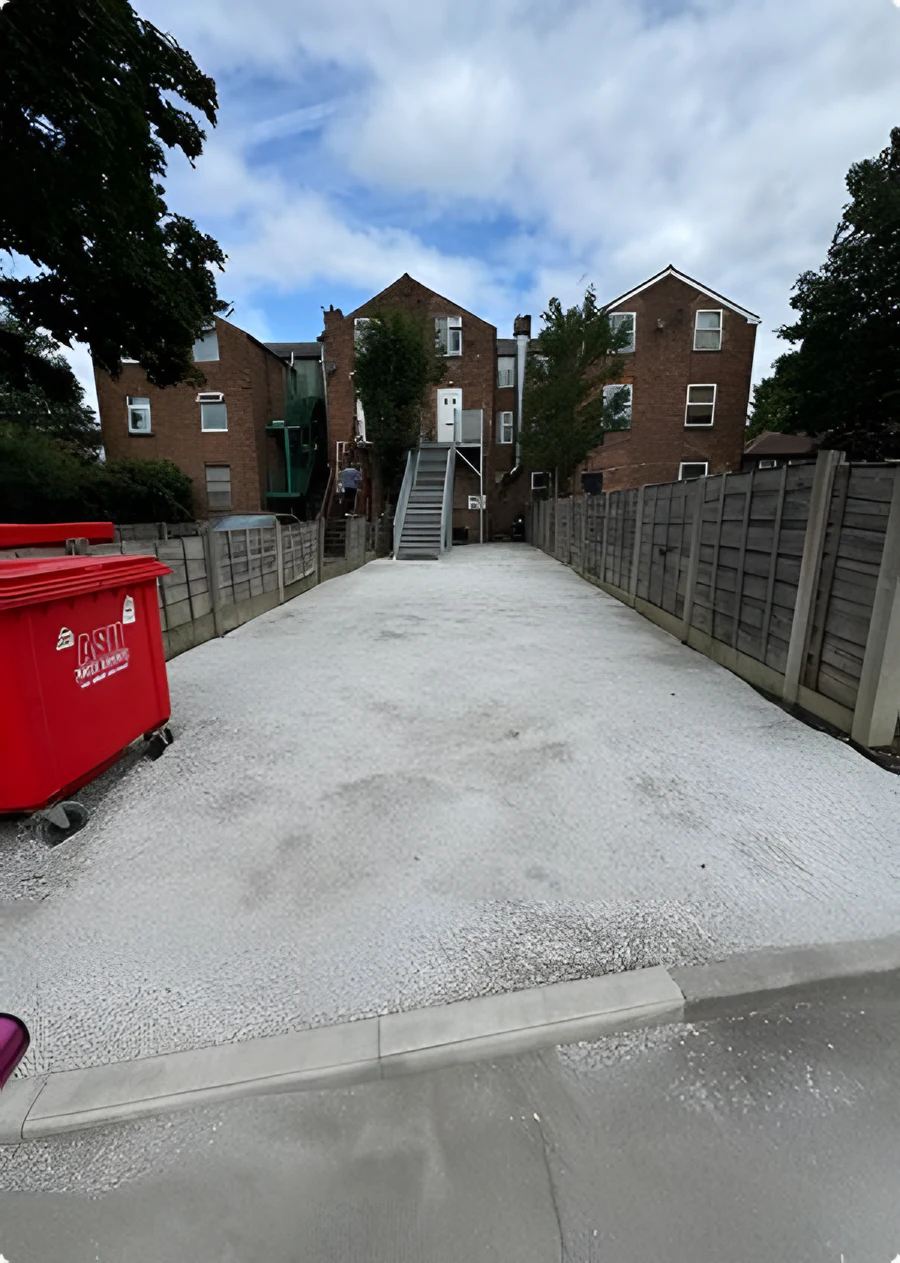 After: cleared and resurfaced gravel driveway