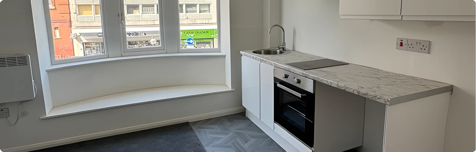 New kitchen with fitted worktop and cabinets
